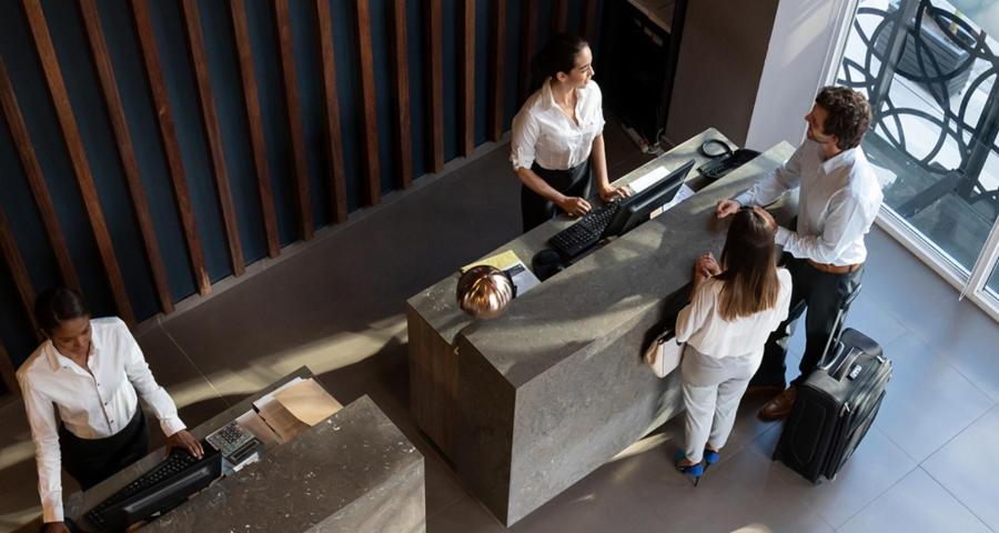 Looking down at the check-in area of a hotel