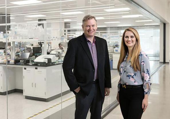 Vice President of Finance and Corporate Controller, Arcturus Therapeutics, posing outside a lab